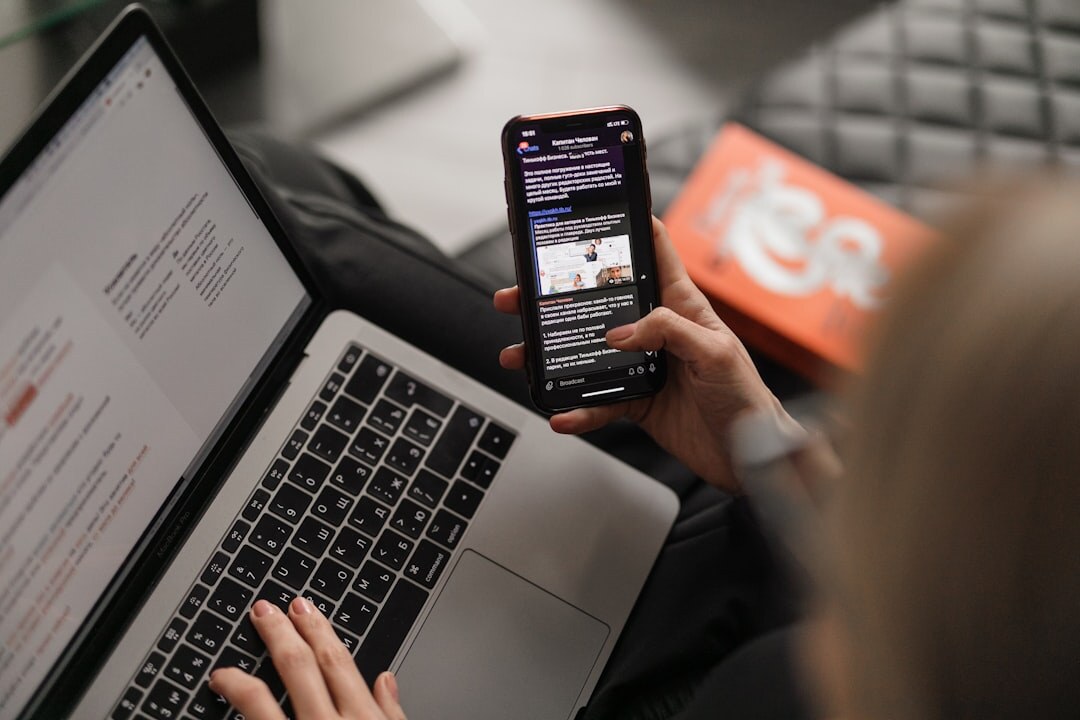 person reading news on phone